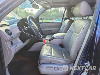 Zdjęcie 7 z 14 samochodu: 2013 HONDA PILOT EXLN VIN:5FNYF3H77DB015400 - miniatura