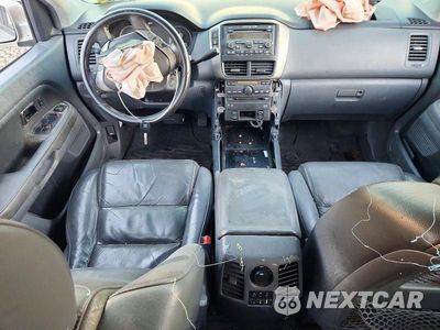 Zdjęcie 8 z 13 samochodu: 2006 HONDA PILOT EX VIN:2HKYF18606H556742 - miniatura