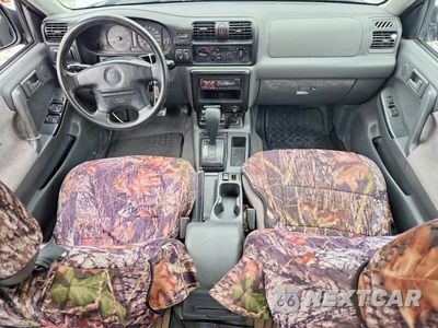 Zdjęcie 8 z 13 samochodu: 1999 HONDA PASSPORT VIN:4S6CK58W8X4409530 - miniatura