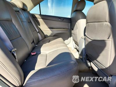 Zdjęcie 10 z 13 samochodu: 2003 TOYOTA CAMRY LE VIN:4T1BE32K43U788199 - miniatura