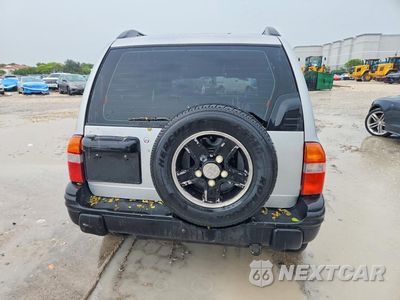 Zdjęcie 6 z 13 samochodu: 2003 CHEVROLET TRACKER VIN:2CNBE13CX36953148 - miniatura