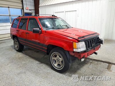 Czwarte zdjęcie samochodu z boku: 1998 JEEP GRAND CHEROKEE LAREDO VIN:1J4GZ58S3WC188859 - miniatura