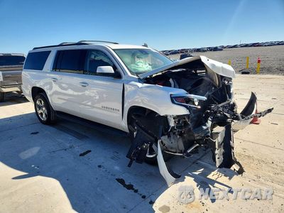 Czwarte zdjęcie samochodu z boku: 2020 CHEVROLET SUBURBAN C1500 LT VIN:1GNSCHKC0LR194381 - miniatura