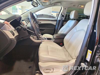Zdjęcie 7 z 13 samochodu: 2015 CADILLAC SRX VIN:3GYFNAE39FS542679 - miniatura