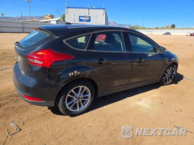 Trzecie zdjęcie samochodu z tyłu: 2016 FORD FOCUS SE VIN:1FADP3K21GL309388 - miniatura