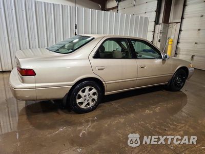 Trzecie zdjęcie samochodu z tyłu: 1999 TOYOTA CAMRY LE V6 VIN:JT2BF22K2X0159784 - miniatura