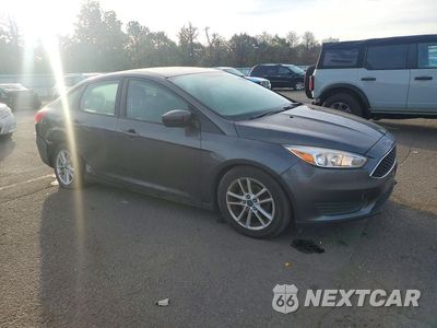 Czwarte zdjęcie samochodu z boku: 2017 FORD FOCUS SE VIN:1FADP3F24HL326567 - miniatura