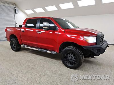 Czwarte zdjęcie samochodu z boku: 2012 TOYOTA TUNDRA CREWMAX LIMITED VIN:5TFHY5F10CX244980 - miniatura