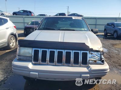 Piąte zdjęcie samochodu w środku: 1998 JEEP GRAND CHEROKEE LAREDO VIN:1J4GZ48S5WC274524 - miniatura