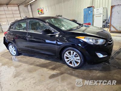 Czwarte zdjęcie samochodu z boku: 2014 HYUNDAI ELANTRA GT BASE VIN:KMHD35LH9EU200278 - miniatura