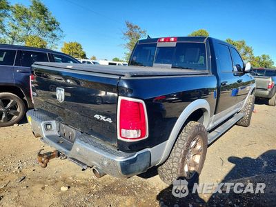 Trzecie zdjęcie samochodu z tyłu: 2014 RAM 1500 VIN:1C6RR7NT4ES182250 - miniatura