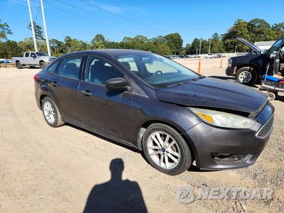 Czwarte zdjęcie samochodu z boku: 2017 FORD FOCUS S VIN:1FADP3E21HL263221 - miniatura