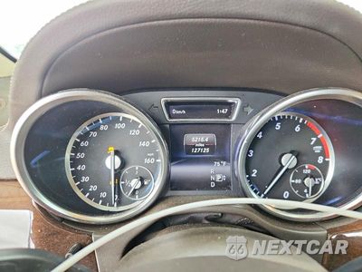 Zdjęcie 9 z 13 samochodu: 2015 MERCEDES-BENZ GL 450 4MATIC VIN:4JGDF6EE4FA507036 - miniatura