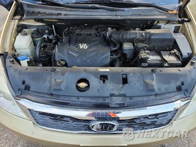 Zdjęcie 12 z 13 samochodu: 2011 KIA SEDONA LX VIN:KNDMG4C78B6405049 - miniatura