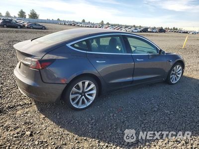 Trzecie zdjęcie samochodu z tyłu: 2019 TESLA MODEL 3 VIN:5YJ3E1EB8KF418549 - miniatura