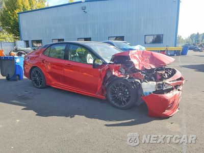 Czwarte zdjęcie samochodu z boku: 2022 TOYOTA CAMRY XSE VIN:4T1K61BK8NU055965 - miniatura