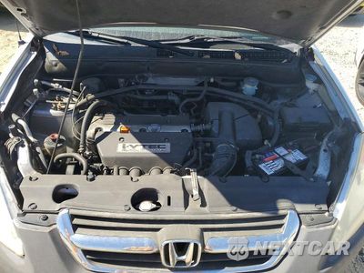 Zdjęcie 12 z 13 samochodu: 2003 HONDA CR-V LX VIN:JHLRD68533C000417 - miniatura