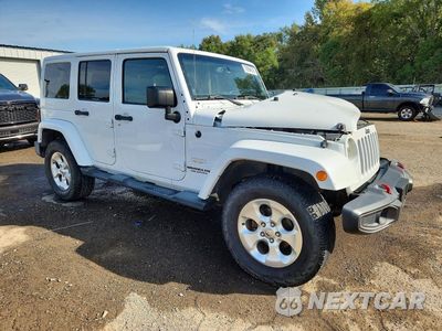 Czwarte zdjęcie samochodu z boku: 2013 JEEP WRANGLER UNLIMITED SAHARA VIN:1C4BJWEG8DL557855 - miniatura