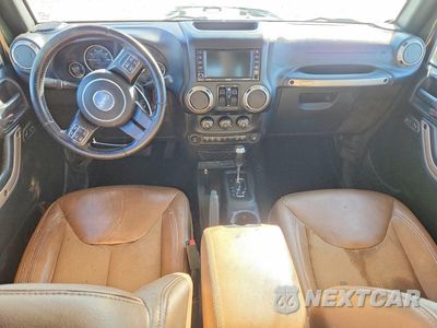 Zdjęcie 8 z 12 samochodu: 2016 JEEP WRANGLER UNLIMITED SAHARA VIN:1C4BJWEG3GL314619 - miniatura