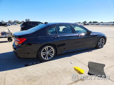Trzecie zdjęcie samochodu z tyłu: 2019 BMW 750 I VIN:WBA7F0C54KGM24406 - miniatura