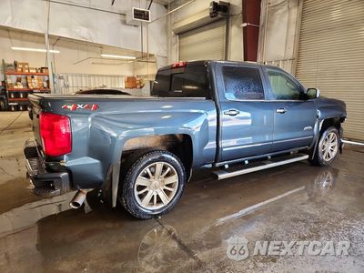 Trzecie zdjęcie samochodu z tyłu: 2018 CHEVROLET SILVERADO K1500 HIGH COUNTRY VIN:3GCUKTEJ5JG528161 - miniatura