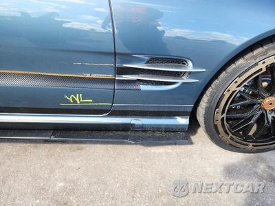 Zdjęcie 12 z 13 samochodu: 2003 MERCEDES-BENZ SL 500R VIN:WDBSK75F73F040553 - miniatura