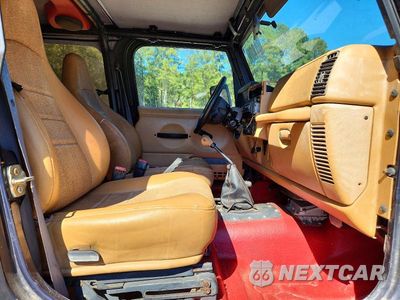 Zdjęcie 10 z 12 samochodu: 1998 JEEP WRANGLER / TJ SPORT VIN:1J4FY19S1WP705624 - miniatura