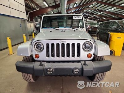 Piąte zdjęcie samochodu w środku: 2012 JEEP WRANGLER SAHARA VIN:1C4GJWBG1CL105951 - miniatura