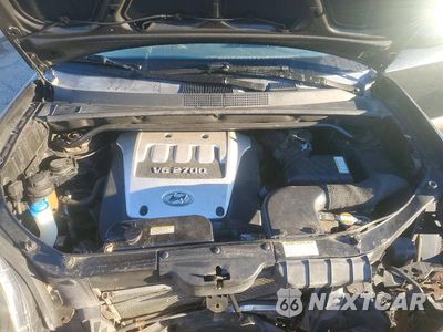 Zdjęcie 12 z 14 samochodu: 2005 HYUNDAI TUCSON GLS VIN:KM8JN72D15U066485 - miniatura