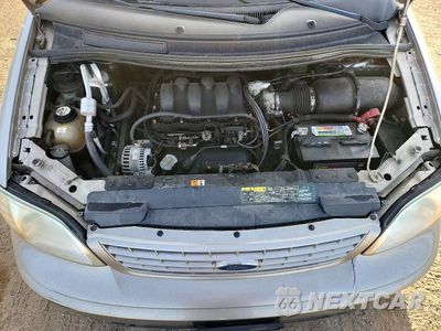 Zdjęcie 12 z 13 samochodu: 2003 FORD WINDSTAR LX VIN:2FMZA51403BA52908 - miniatura