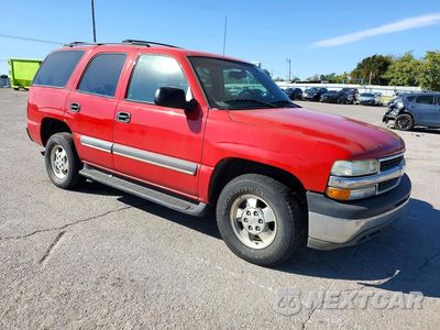 Czwarte zdjęcie samochodu z boku: 2002 CHEVROLET TAHOE C1500 VIN:1GNEC13ZX2R311650 - miniatura