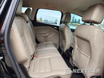 Zdjęcie 11 z 14 samochodu: 2017 FORD ESCAPE TITANIUM VIN:1FMCU0J9XHUD95786 - miniatura