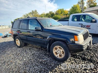 Czwarte zdjęcie samochodu z boku: 1996 JEEP GRAND CHEROKEE LIMITED VIN:1J4GZ78SXTC365088 - miniatura