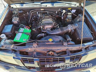 Zdjęcie 12 z 13 samochodu: 2004 ISUZU RODEO S VIN:4S2CK58W744315524 - miniatura