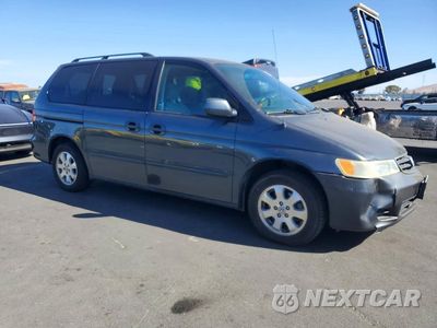 Czwarte zdjęcie samochodu z boku: 2004 HONDA ODYSSEY EX VIN:5FNRL18684B061925 - miniatura