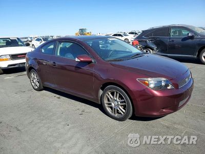 Czwarte zdjęcie samochodu z boku: 2005 SCION TC BASE VIN:JTKDE177750050096 - miniatura