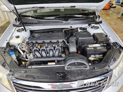 Zdjęcie 11 z 12 samochodu: 2009 KIA OPTIMA LX VIN:KNAGE228295317354 - miniatura