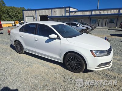 Czwarte zdjęcie samochodu z boku: 2017 VOLKSWAGEN JETTA S VIN:3VW2B7AJ5HM415050 - miniatura