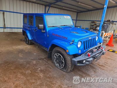Czwarte zdjęcie samochodu z boku: 2015 JEEP WRANGLER UNLIMITED RUBICON VIN:1C4BJWFG7FL726586 - miniatura