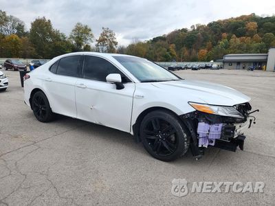 Czwarte zdjęcie samochodu z boku: 2019 TOYOTA CAMRY HYBRID SE VIN:4T1B21HK3KU518156 - miniatura