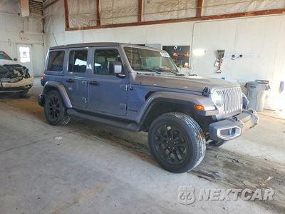 Czwarte zdjęcie samochodu z boku: 2019 JEEP WRANGLER UNLIMITED SAHARA VIN:1C4HJXEN7KW514179 - miniatura