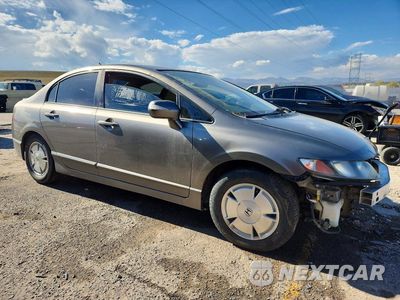 Czwarte zdjęcie samochodu z boku: 2007 HONDA CIVIC HYBRID VIN:JHMFA36237S006003 - miniatura