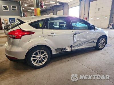 Trzecie zdjęcie samochodu z tyłu: 2017 FORD FOCUS SE VIN:1FADP3K28HL239311 - miniatura