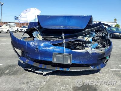 Piąte zdjęcie samochodu w środku: 2022 TESLA MODEL 3 VIN:5YJ3E1EBXNF184693 - miniatura