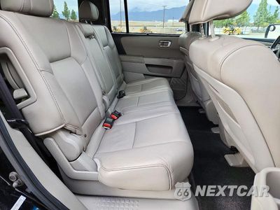 Zdjęcie 11 z 13 samochodu: 2011 HONDA PILOT TOURING VIN:5FNYF3H93BB047405 - miniatura