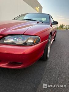 Zdjęcie 13 z 14 samochodu: 1996 FORD MUSTANG GT VIN:1FALP42XXTF190133 - miniatura