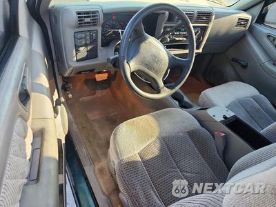Zdjęcie 8 z 13 samochodu: 1996 GMC SONOMA VIN:1GTCS14X6T8535618 - miniatura
