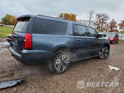 Trzecie zdjęcie samochodu z tyłu: 2020 CHEVROLET SUBURBAN K1500 PREMIER VIN:1GNSKJKJ2LR105404 - miniatura