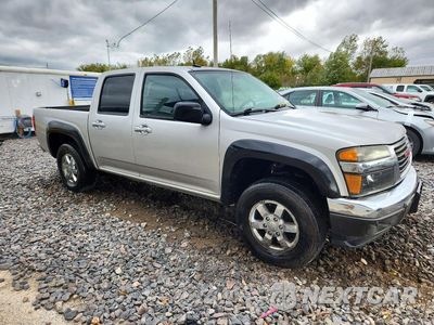 Czwarte zdjęcie samochodu z boku: 2011 GMC CANYON SLE VIN:1GTH6MFE5B8128668 - miniatura