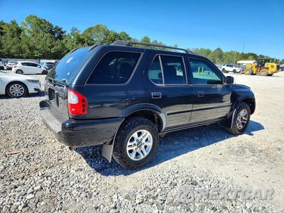 Trzecie zdjęcie samochodu z tyłu: 2004 ISUZU RODEO S VIN:4S2CK58W744315524 - miniatura